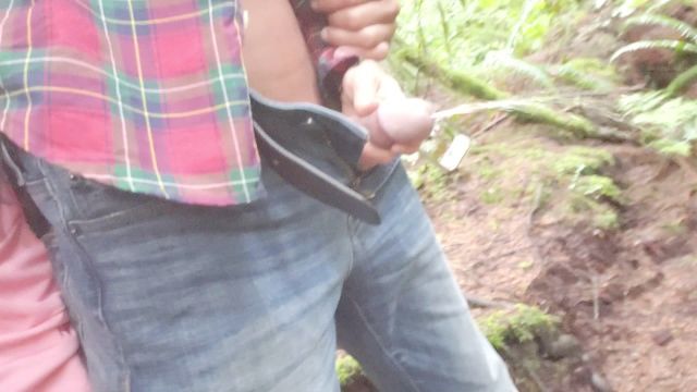 women holding his penis to urinate